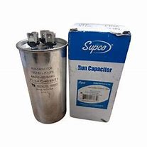 CD50+5X440: OVAL DUAL RUN CAPACITOR.